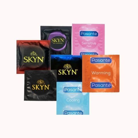 Набір: Skyn Extra Lubricated більше змазки, 5 шт., Skyn Elite Non Latex, тонкі безлатексні 5 шт., Skyn Intense Feel безлатексні, ребристі 5 шт., Skyn Non-Latex Original, безлатексні, 5 шт., Pasante Cooling ребристі-охолоджуючі, 4 шт. MM27034 фото