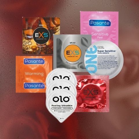 Комплект: EXS Cola Flavoured - 6 шт, EXS Delay - 1 шт, EXS Warming розігріваючі - 12 шт, OLO Black Feeling Ultrathin 1 уп., ONE Super Sensitive - 1 шт, Pasante Ultra Sensitive Touch - 16 шт, Pasante Warming - 13 шт MM2403 фото